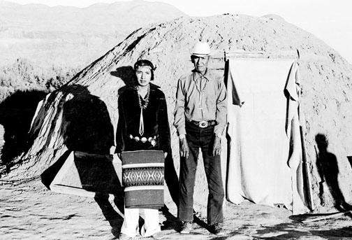 Jim stands in front of a hogan with his maternal uncle, Kin Lichii’nii Nez, in the late summer of 1979, shortly before Jim would depart to attend school in North Carolina. The uncle had performed a “blessingway” ceremony for the upcoming trip.