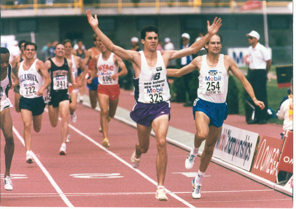 Bill Burke ’91, shown with arms raised at the 1993 USA Track and Field Championships, ran Prnceton’s only sub-4:00 mile by an undergraduate.