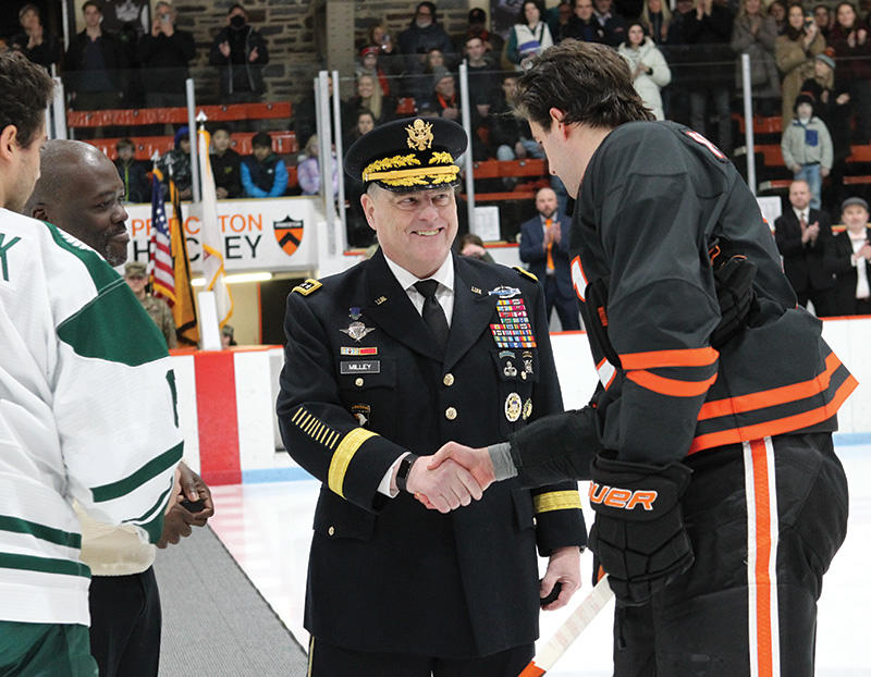 Milley drops the puck earlier this year to celebrate the 100th anniversary of Baker Rink, where he played for four years. 