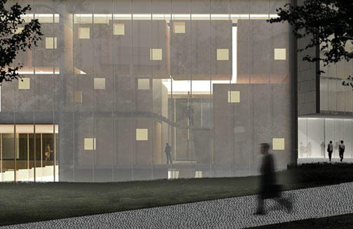 A night view of the music building shows rehearsal rooms visible through a translucent glass wall. 