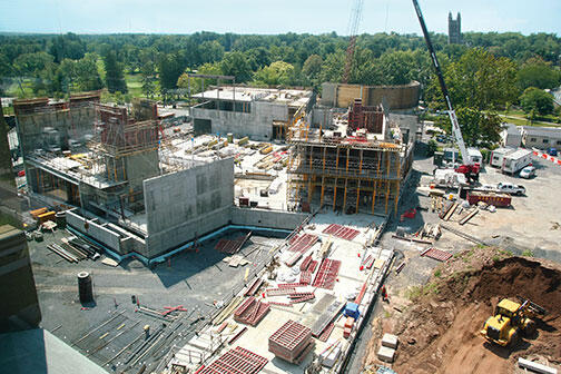 OTC-ConsArts4734new1.jpg Concrete and steel have been rising for the three buildings on Alexander Street that will provide academic, rehearsal, and performance spaces for the music department, at left, and for the Lewis Center for the Arts.