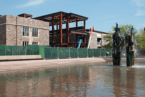 Facing Scudder Plaza, steel girders mark the location of a new atrium and entrance to the home of international programs in the former chemistry building at 20 Washington Road.