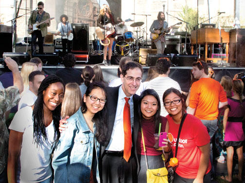 OTC-InstallConcert2405.jpg President Eisgruber ’83 poses with students during the concert that followed his installation.