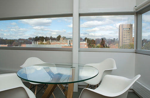 Offices feature architect-designed furnishings and expansive windows.