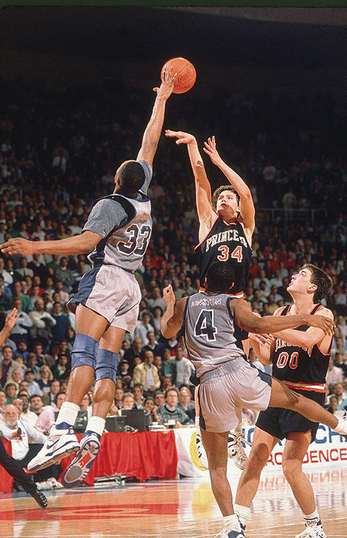 OTC-SP-georgetowngame_web.jpg Alonzo Mourning blocks a shot by Bob Scrabis ’89 in the 1989 NCAA Tournament. The Tigers’ Kit Mueller ’91 would get one more chance, but Mourning blocked that attempt as well.