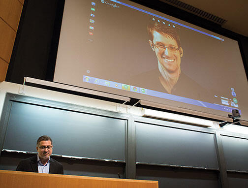 OTC-Snowden0010new.jpg Journalist Bart Gellman ’82, left, talks with Edward Snowden via video link.