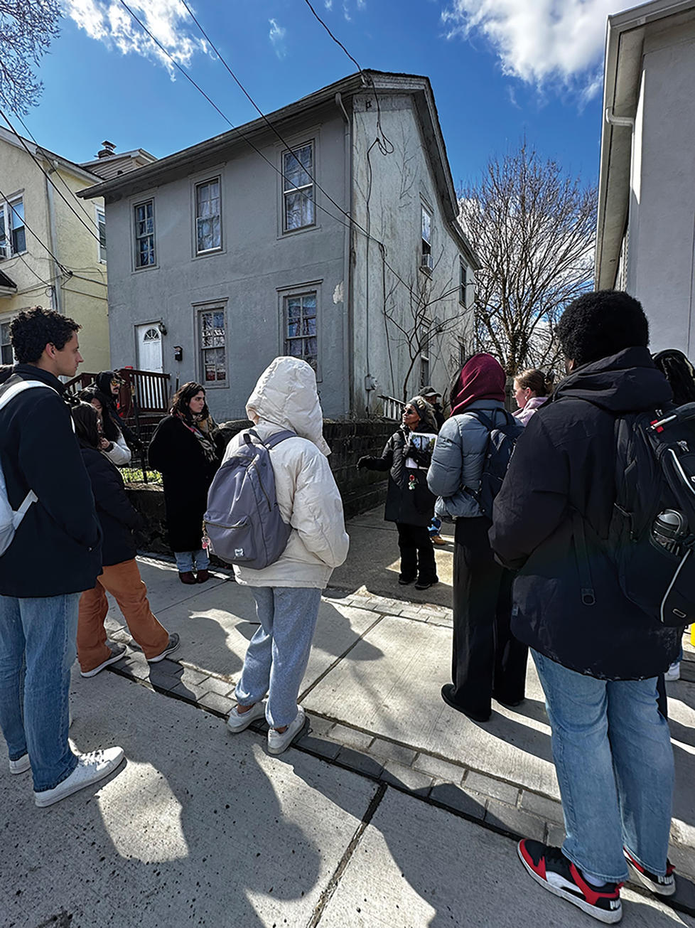 Fern Spruill, center, leads students on a walking tour