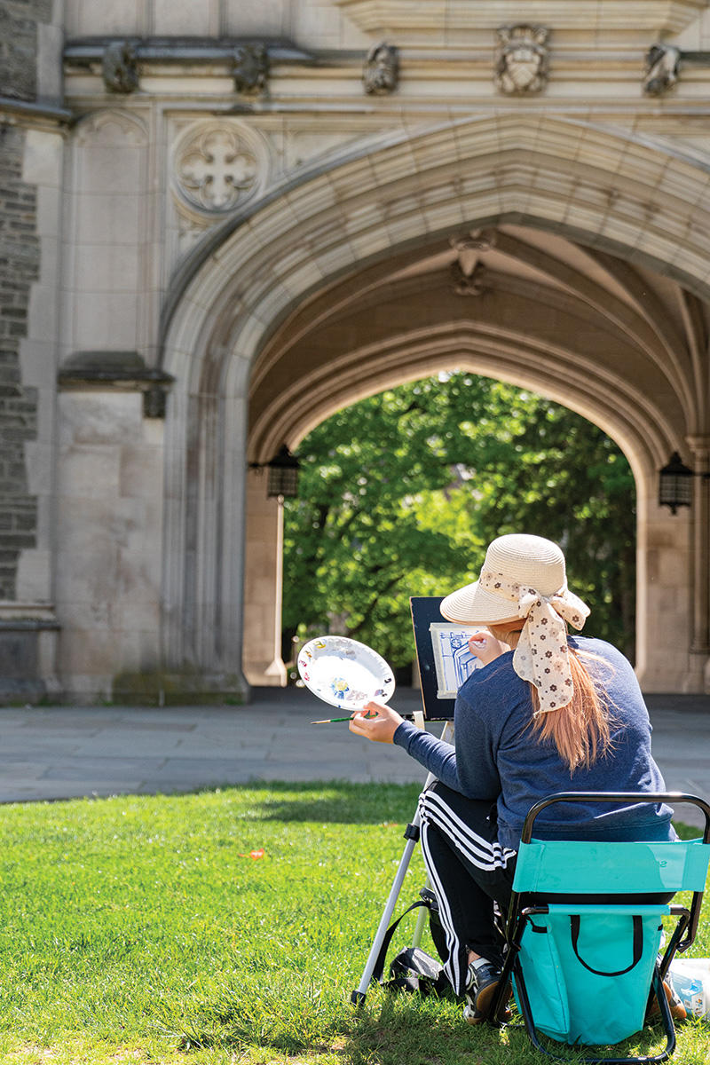 Person painting picture on site of Blair Arch