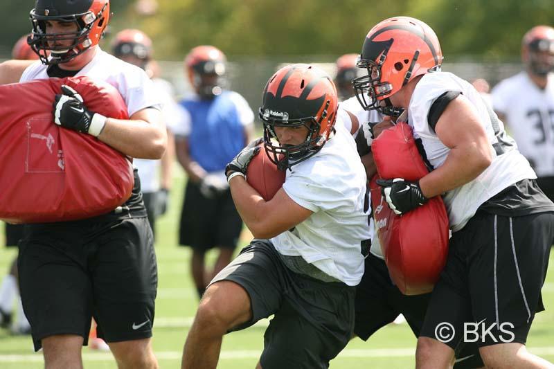 Freshman running back Joe Rhattigan shoulders his way through the defense.