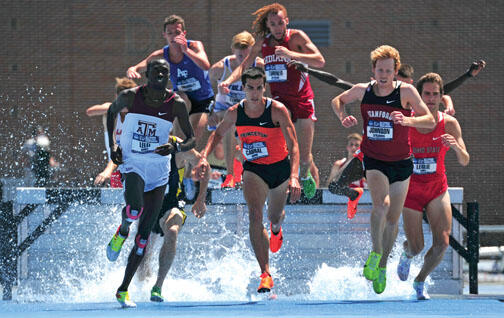 SP_Cabral.jpg Donn Cabral ’12, center, won the 3,000-meter steeplechase at the NCAA Championships to become the first Princeton runner to win an NCAA title since 1934.