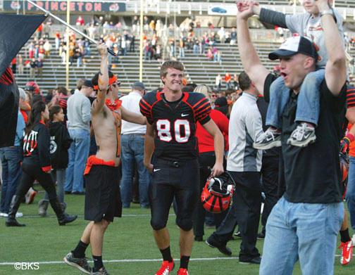 Students and alumni stormed the field to celebrate the Tigers’ stunning win with the players, including Luke Taylor ’13.