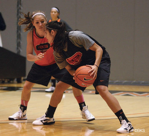 Standouts on the women’s basketball team include point guard Lauren Polansky ’13, left, and forward Niveen Rasheed ’13, at a practice.