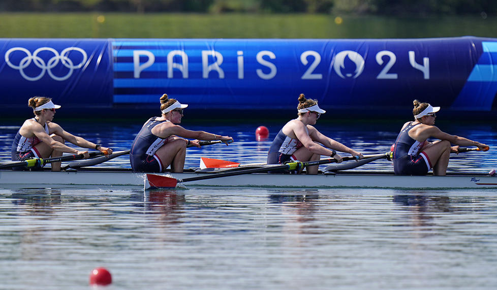 From left, Emily Kallfelz ’19, Kelsey Reelick ’14, Daisy Mazzio-Manson, and Kate Knifton of the Unites States compete in women’s four during the Paris 2024 Olympic Summer Games at Vaires-sur-Marne Nautical Stadium.