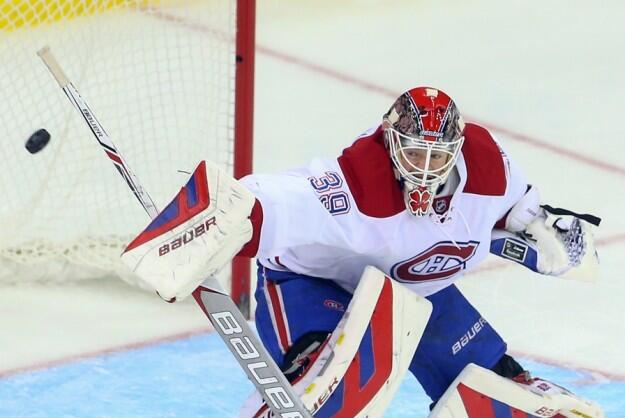 Mike Condon â13 makes a save during a Nov. 27 Montreal win against the New Jersey Devils. (Ed Mulholland, USA TODAY Sports)
