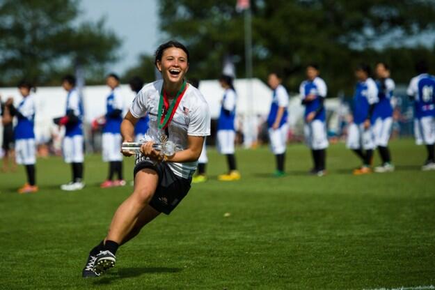 Lyra Olson â16 accepts the team spirit trophy for the United States at Julyâs World Under-23 Ultimate Championships. (Ultiphotos/Kevin Leclaire) 