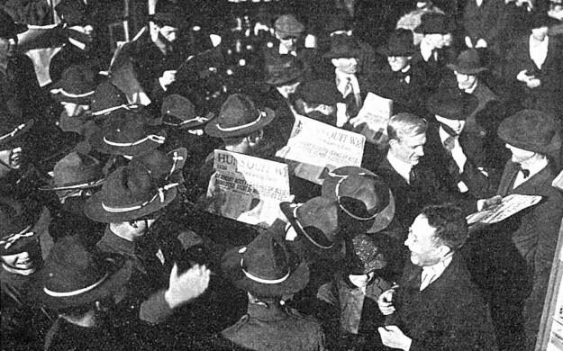 Students and soldiers read news of the end of World War I. (PAW Archives/Orren Jack Turner)