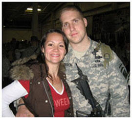 Lauren (Holuba) Nelson '04, shown with her husband Tom in February, was honored for her efforts supporting wives and families of men who served in Afghanistan and Iraq.