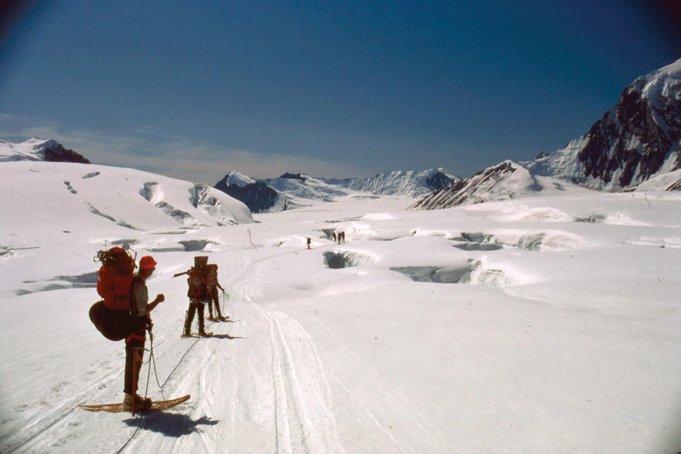 Moving across the Kailtna Glacier in showshoes.