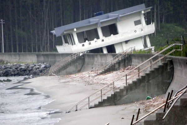 A bayfront guesthouse in Kamaishi destroyed by the tsunami, as was the concrete walkway. 