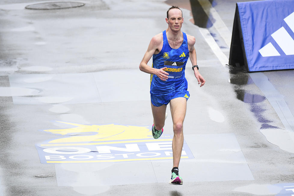 lone runner near the finish line of the Boston Marathon