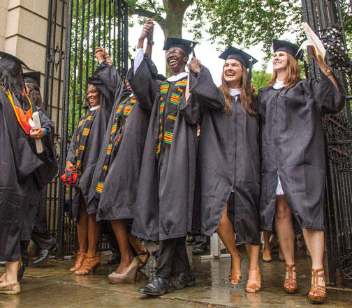 Graduates from the Great Class of 2015 rejoice as they exit campus through FitzRandolph Gate.