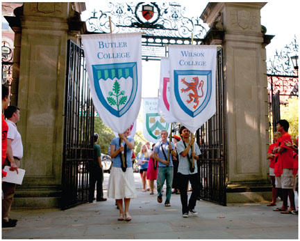 Welcome to Princeton!  For the first time, the annual “Pre-rade” of freshmen was led by banners bearing the shields of Princeton’s six undergraduate residential colleges.