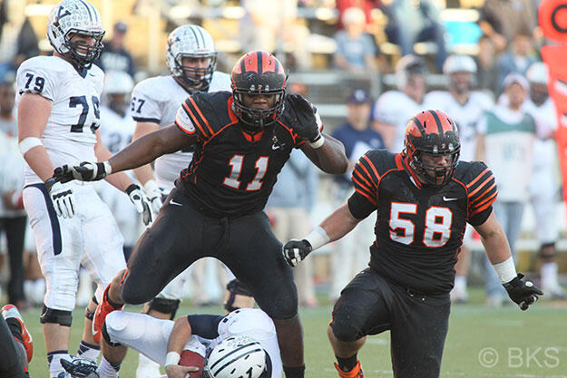 Caraun Reid â14, left, made an impression on Ivy League quarterbacks. Heâs hoping to do the same in the NFL. (Beverly Schaefer)