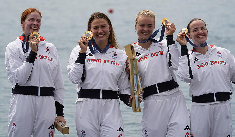 Hannah Scott ’21, second from right, celebrates with teammates Lauren Henry, Lola Anderson, and Georgina Brayshaw after winning gold in the women’s quadruple sculls. Sarah Phipps, USA TODAY Sports