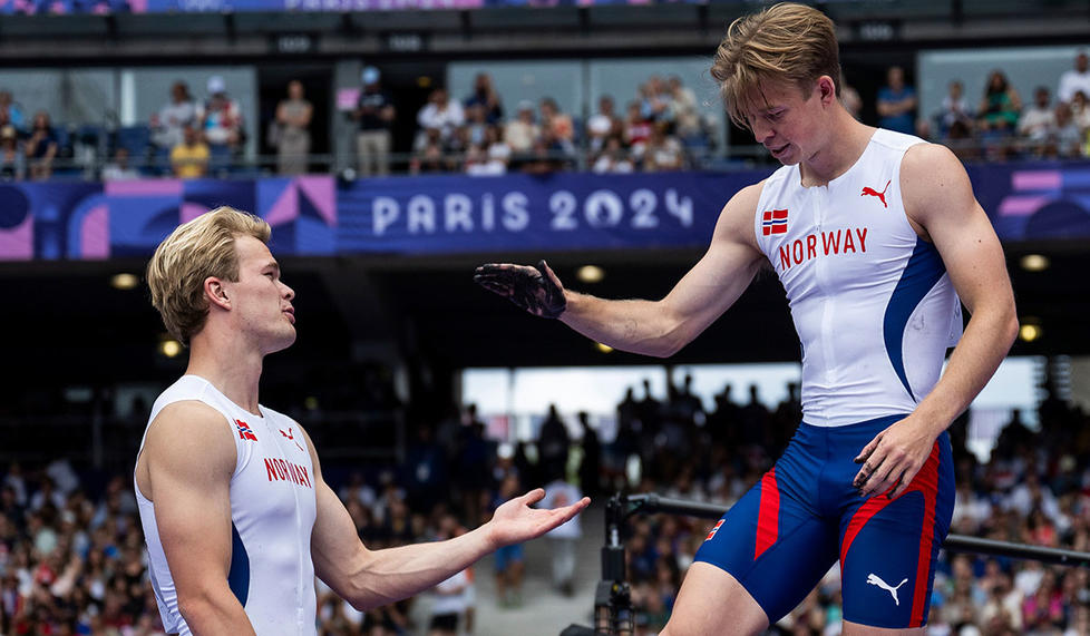 Sondre Guttormsen ’23, left, and Simen Guttormsen ’23 of Norway compete in the pole vault qualification.