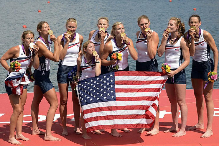 Aug. 2: For Caroline Lind '06, second from right, a second trip to the Olympics meant a second gold medal with the U.S. women's eight. Canadian rowers Andreanne Morin '06 and Lauren Wilkinson '11 earned silver in the same event.